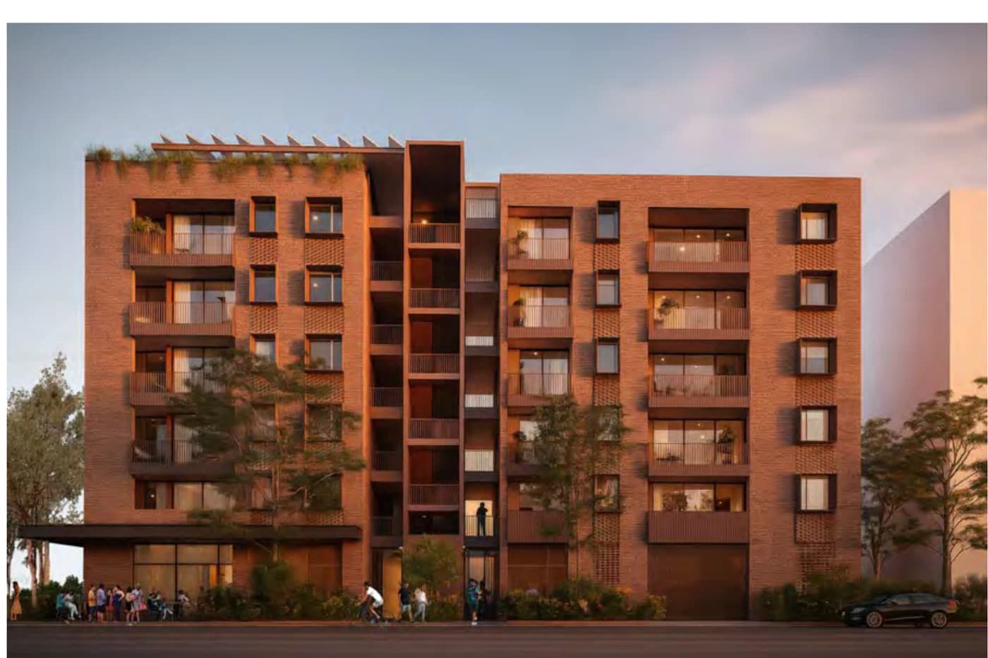Pattern Book Corner Lot Apartments 01 street facade in the Earth material palette with warm red and ochre brick