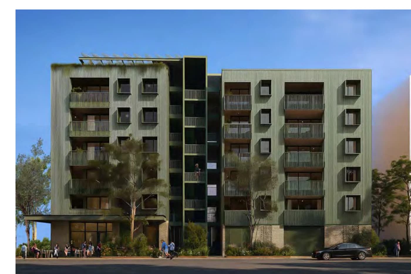 Pattern Book Corner Lot Apartments 01 street facade in the Forest material palette with pale masonry and dark green cladding